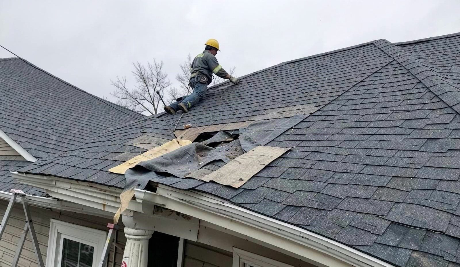 Temporary Roof Patching Crew Arriving On Site